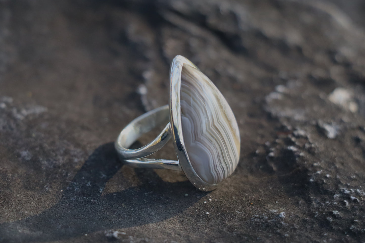 Handcrafted Silver Ring with Banded Agate promoting stillness and inner discipline.