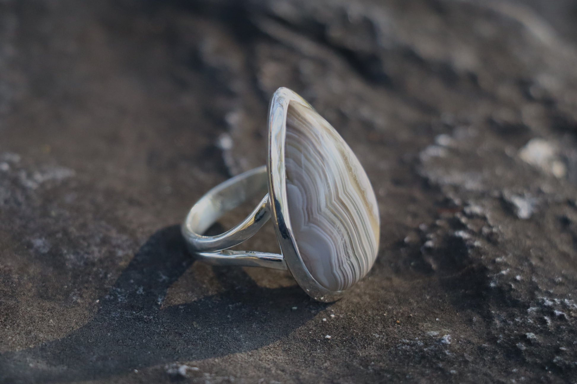 Handcrafted Silver Ring with Banded Agate promoting stillness and inner discipline.