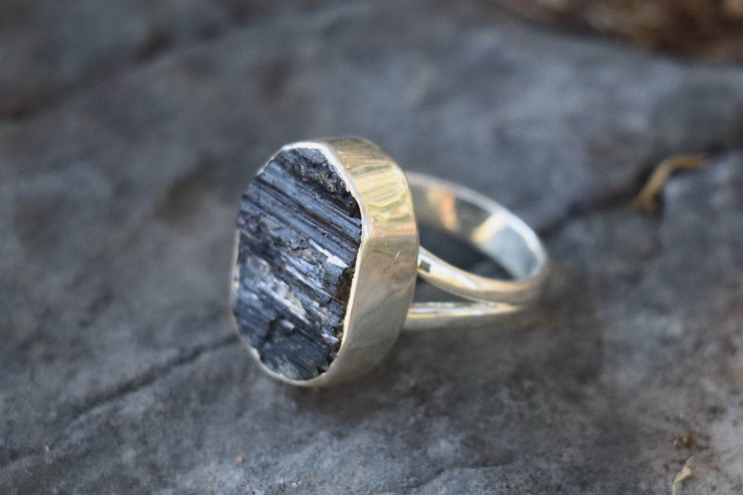 Black Tourmaline statement ring showing right side of the raw crystal texture. Saturn Pluto jewelry for Shadow Work and boundaries.