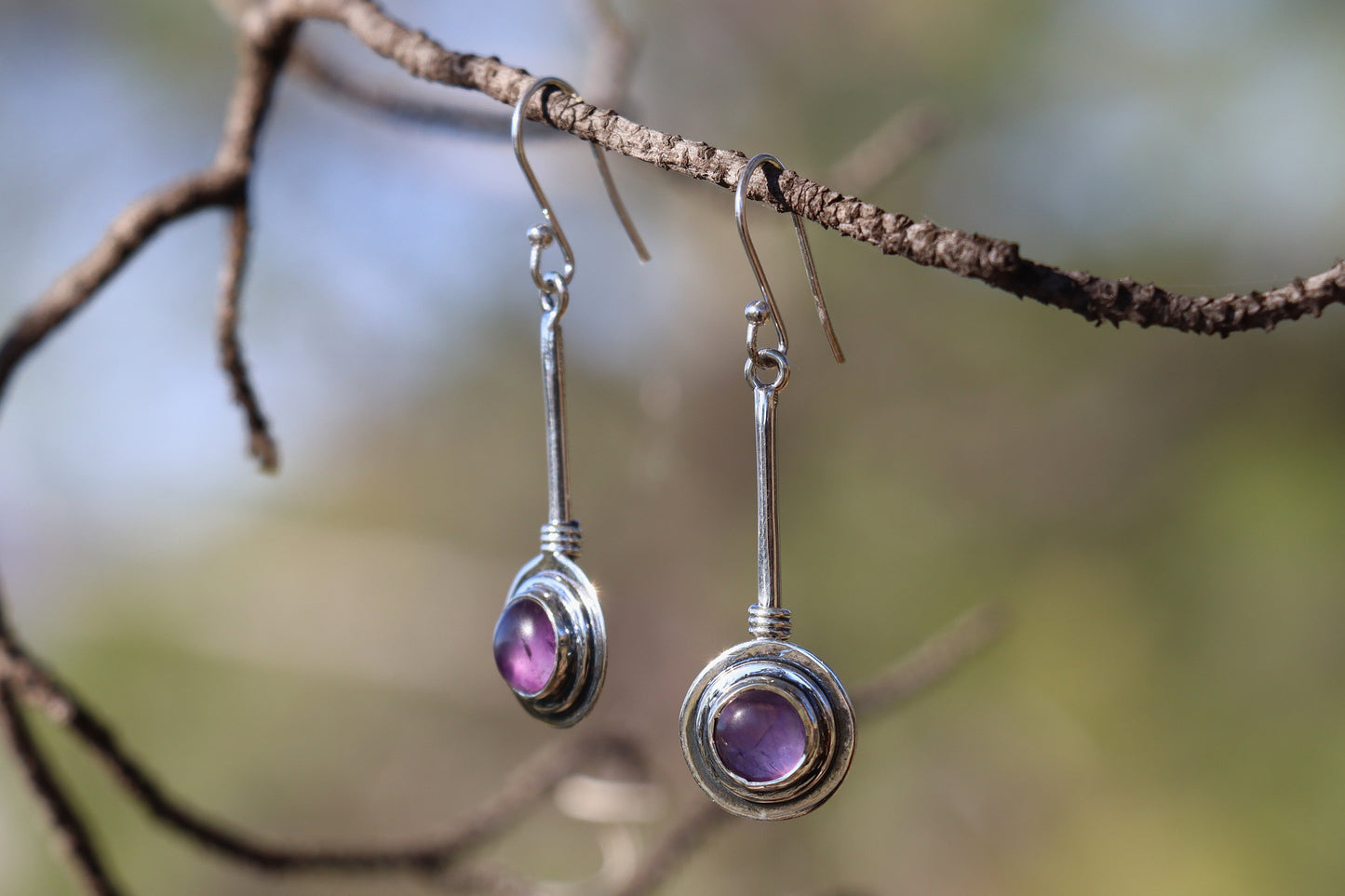 Close up of Amethyst Crystal Jewelry promoting Emotional Balance and Clarity through softness.