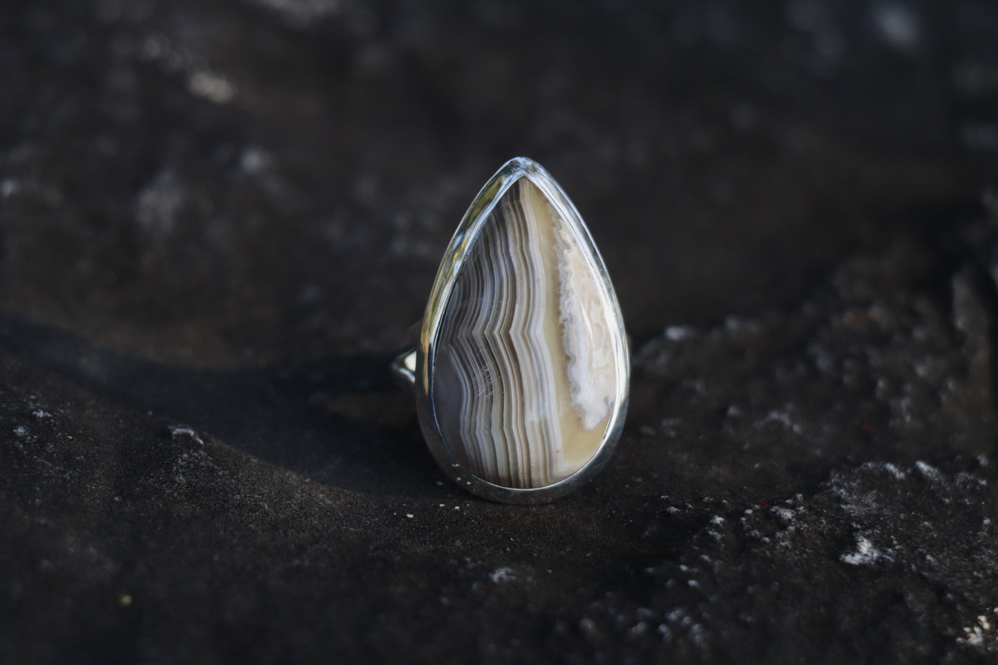 Handcrafted Silver Ring with Banded Agate promoting stillness and inner discipline.