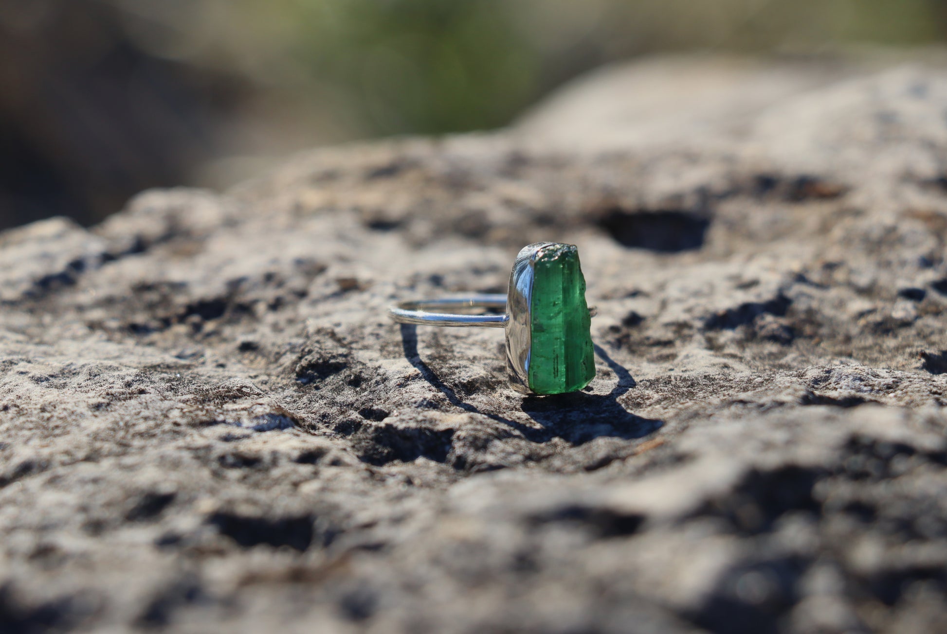 Handcrafted Silver Ring with Green Tourmaline promoting emotional openness and creative blooming.
