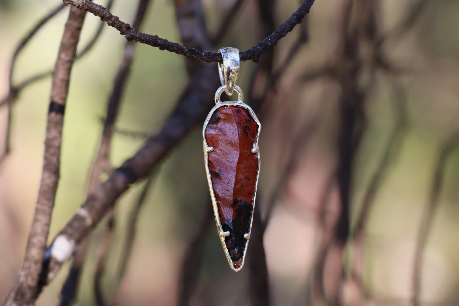 Handcrafted Mahogany Obsidian arrow-shaped pendant. Jewelry for Mars connection and energetic grounding.