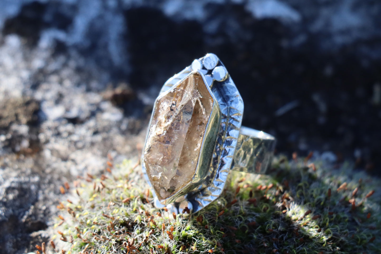 Raw Smoky Quartz gemstone set in 925 Silver. Highlighting its smoky brown color and deep vibrational frequency.