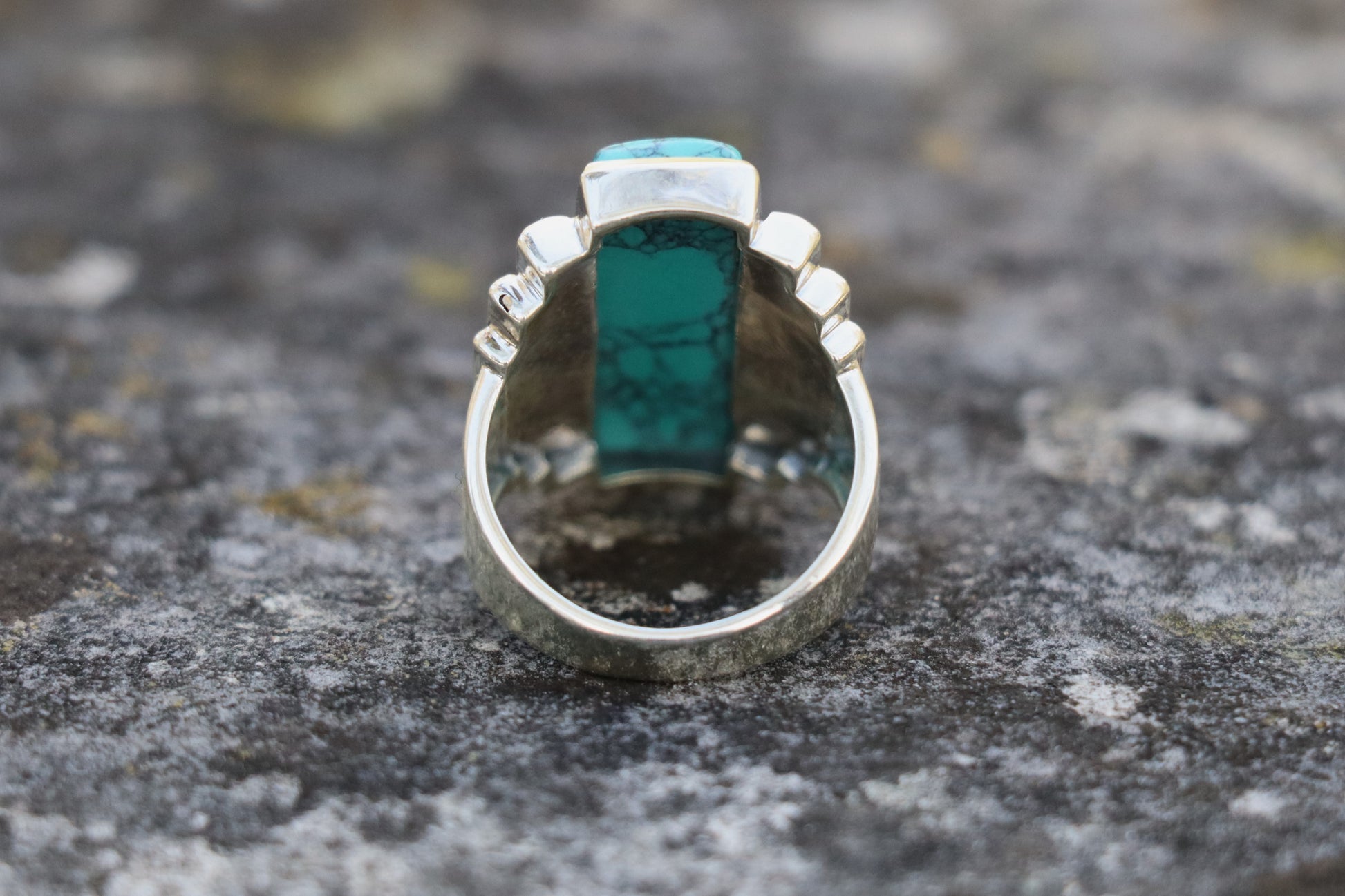 Back view of the Turquoise Statement Ring, revealing the solid 925 Sterling Silver band. Symbolizes grounded protection and a stable energetic foundation.