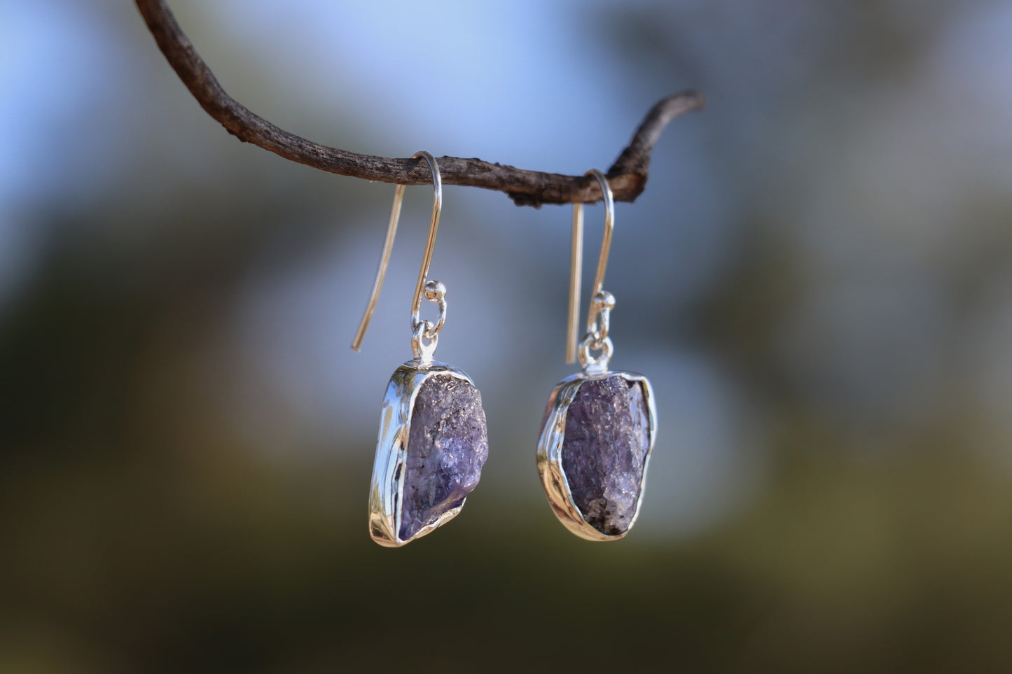 Handcrafted amethyst dangle earrings with rough-cut purple stones set in sterling silver, bohemian gemstone jewelry