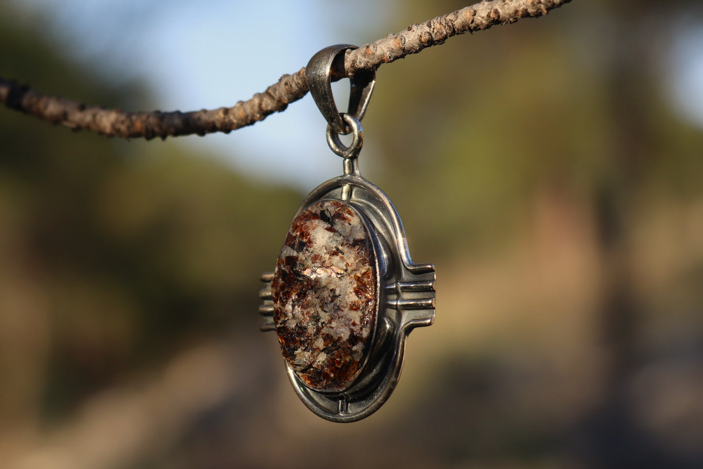 Astrophyllite Talisman for spiritual awakening. Plutonian energy jewelry in 925 silver.