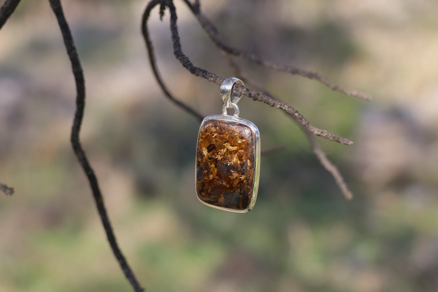 Handcrafted Silver Pendant with Bronzite. Earthy jewelry for root chakra and focus.