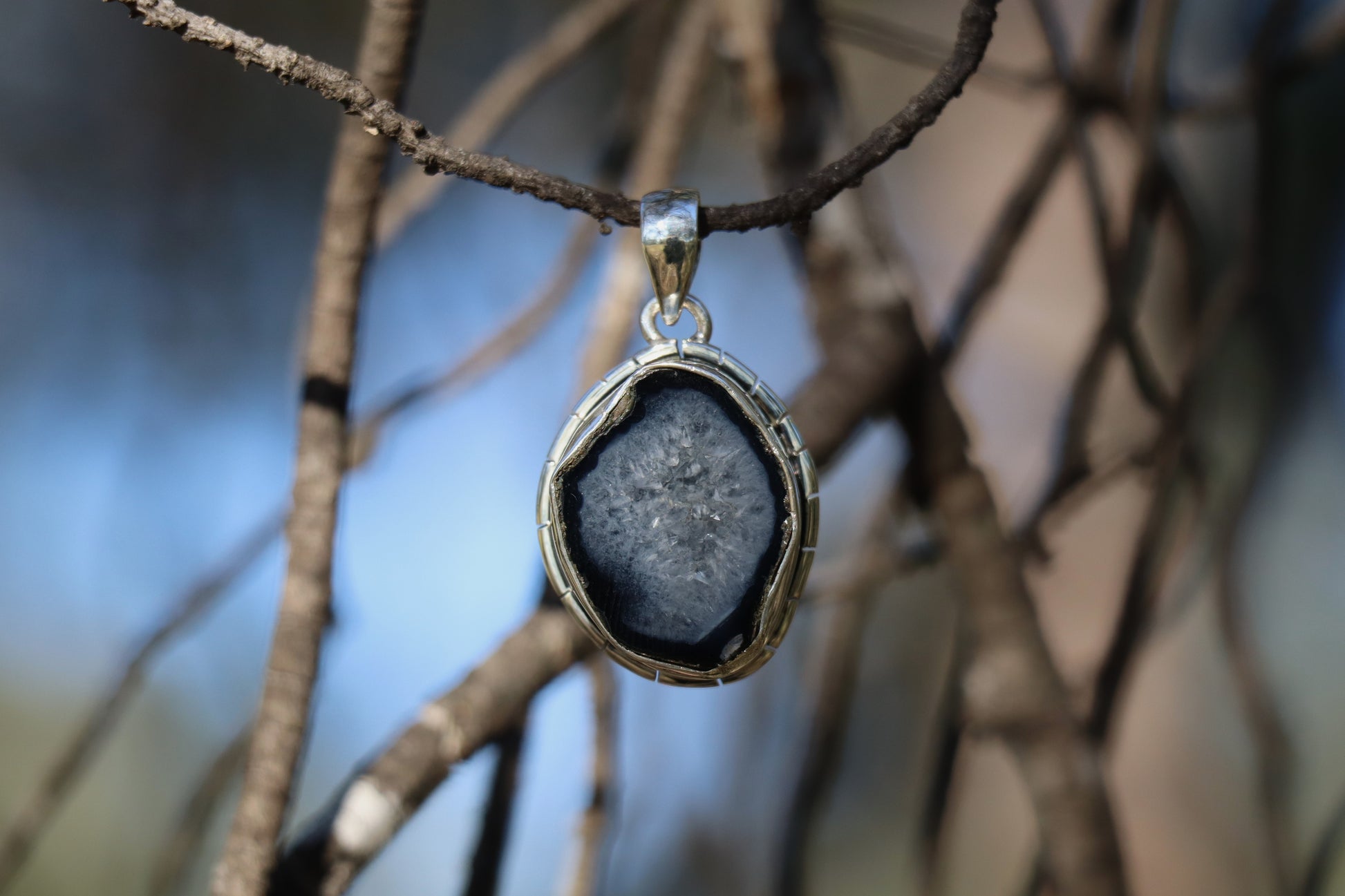 Handcrafted coconut geode pendant in 925 sterling silver with natural druzy quartz crystals