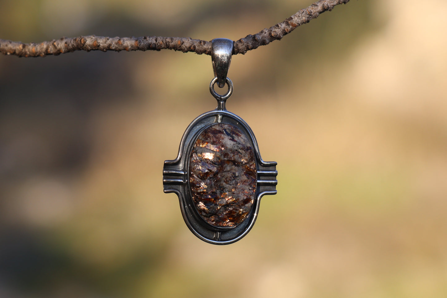 Earthy jewelry featuring Natural Astrophyllite. Grounded awareness and self-acceptance stone.