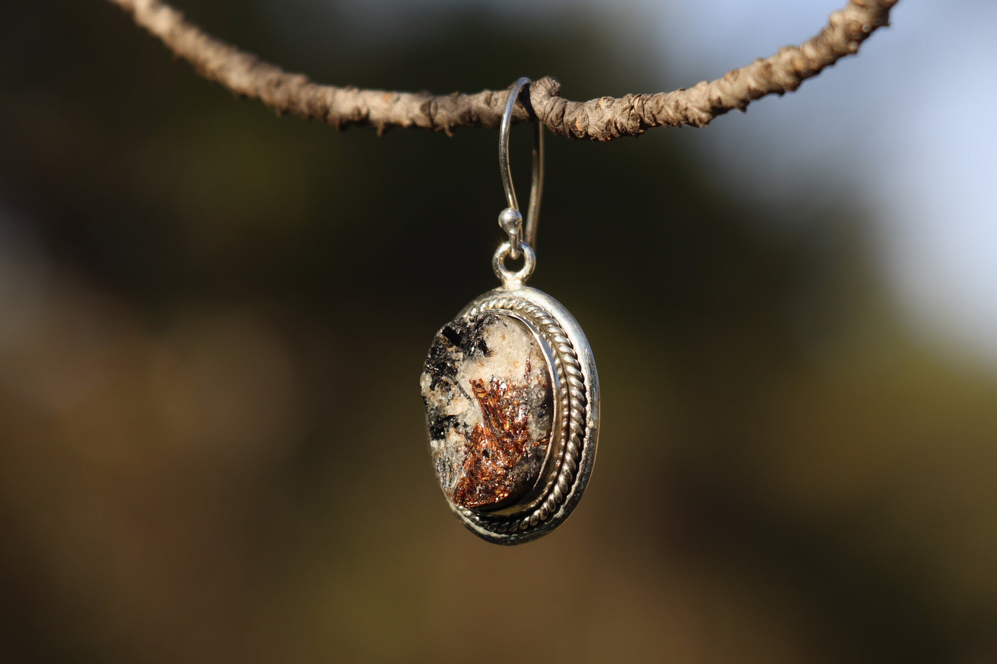 Earthy jewelry featuring Natural Astrophyllite. Transformation stone for self-acceptance.