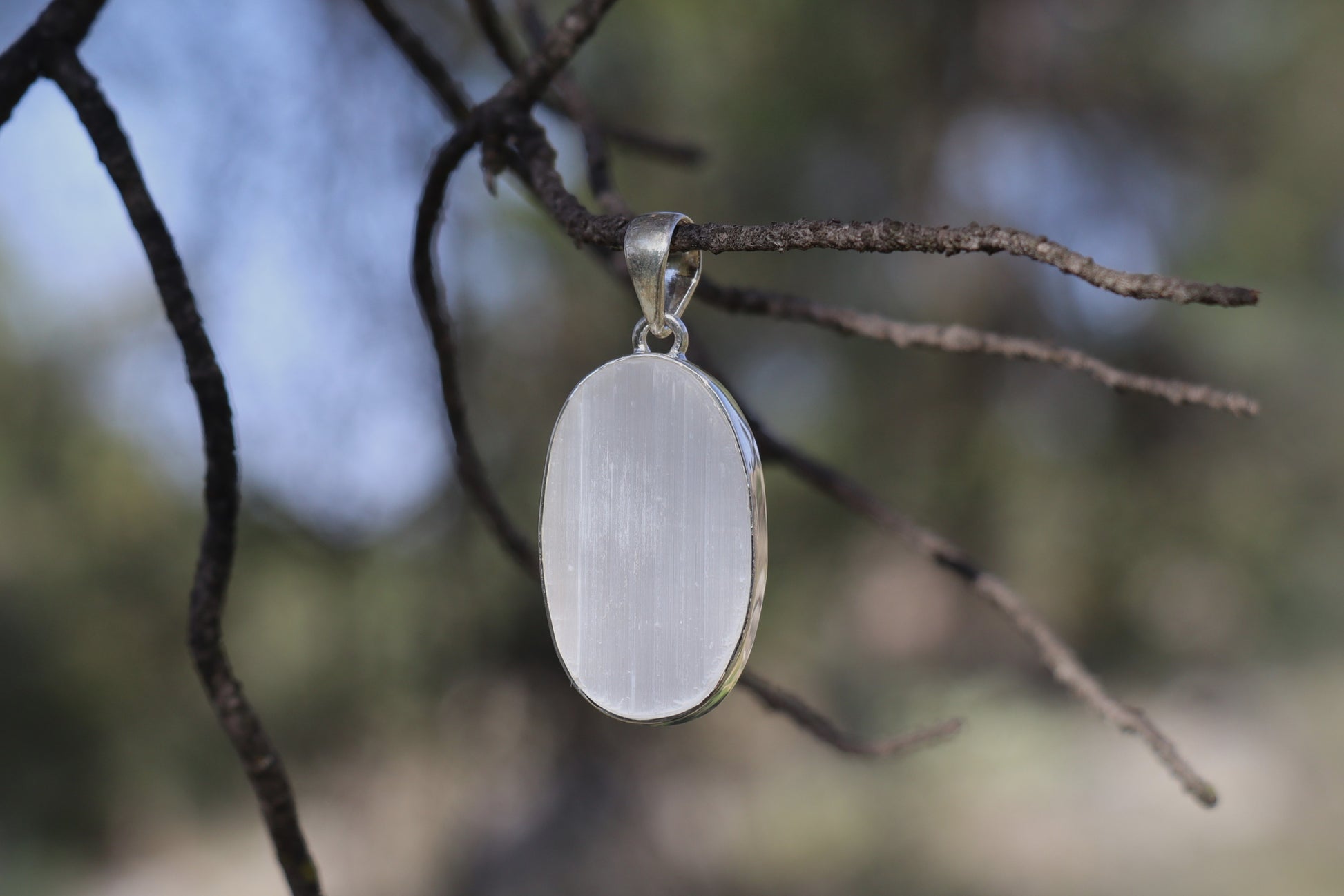 Earthy jewelry featuring Raw Selenite. Empath protection and nervous system support.