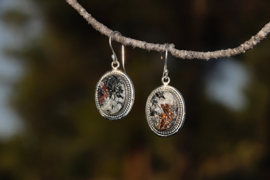 Handcrafted Silver Earrings with Astrophyllite. Witchy jewelry for soul remembrance.