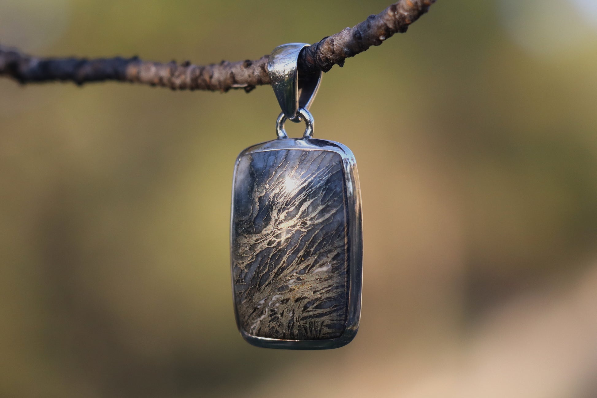 Handcrafted Silver Pendant with Pyrite inclusions. Witchy jewelry for protection.