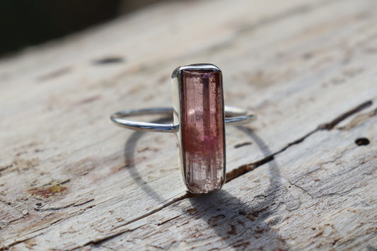 Handcrafted Silver Ring with Pink Tourmaline promoting comfort and heart-based healing.
