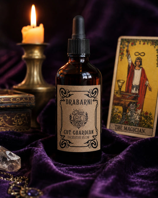 Drabarni organic Gut Guardian tincture for nervous stomach, bloating relief, and IBS. A potent herbal blend for the gut-brain axis to ease trapped gas, stomach cramping, and emotional stress. Handcrafted with planetary timing by a green witch apothecary for natural digestive support on a purple velvet altar.