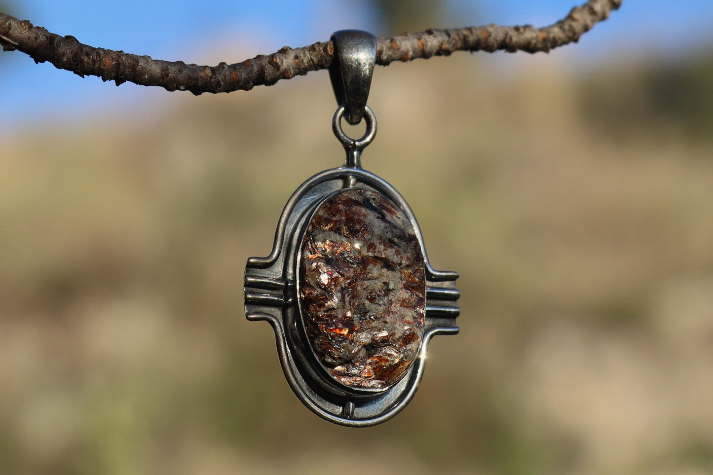 Raw Astrophyllite Crystal showing bronze blades. Inner Light stone for Soul Depth.