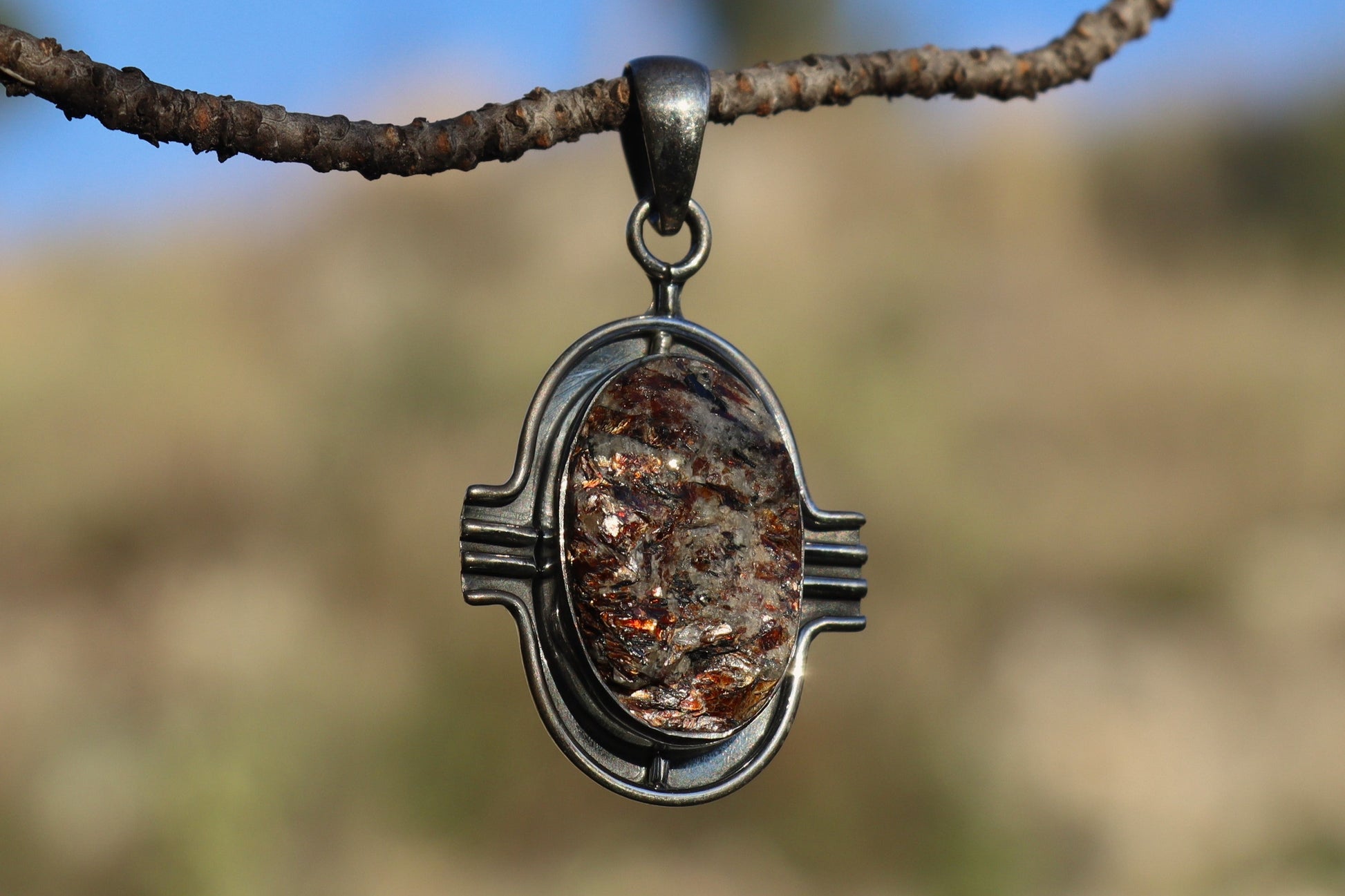 Raw Astrophyllite Crystal showing bronze blades. Inner Light stone for Soul Depth.