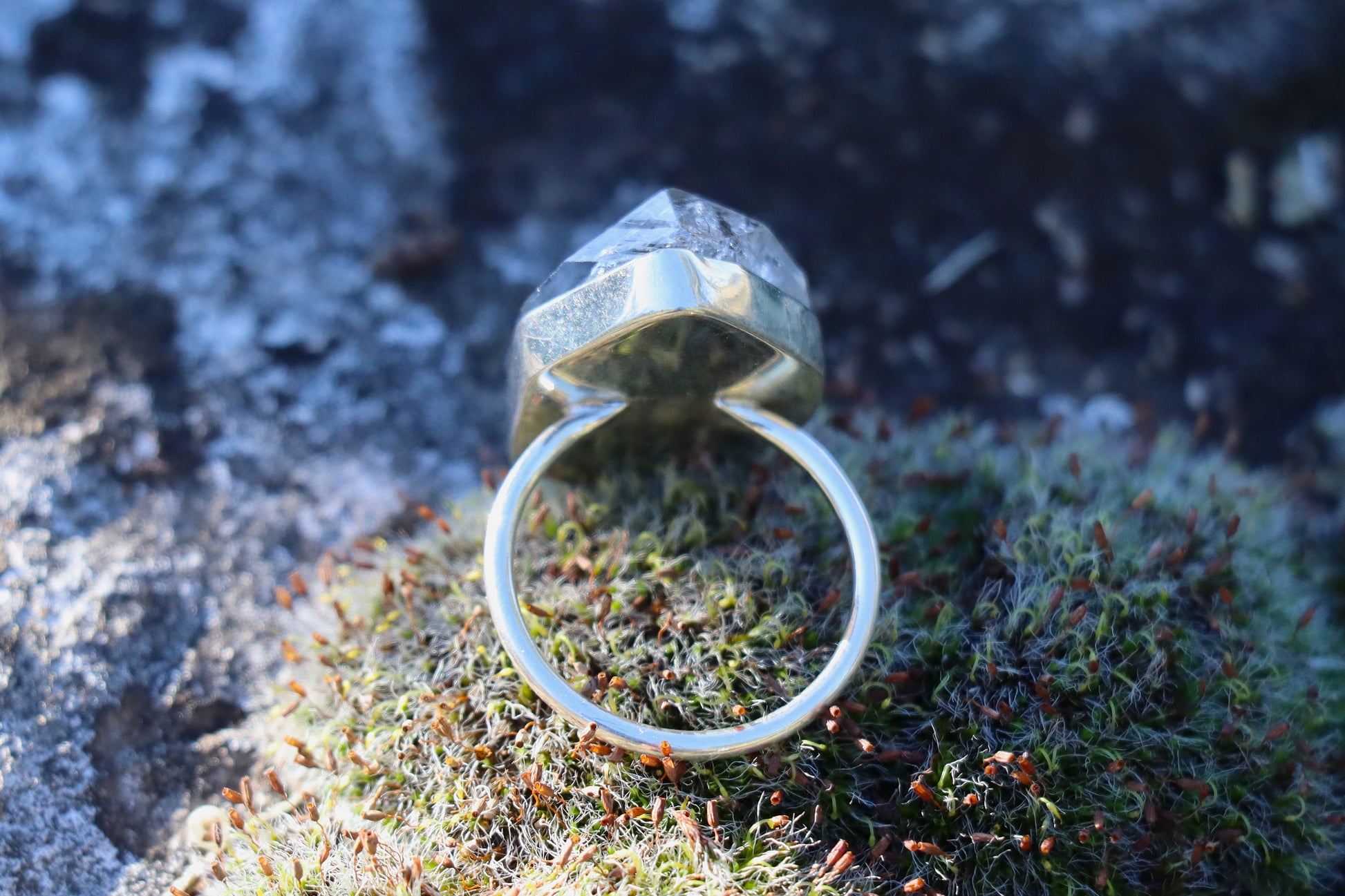 Sterling silver black rutilated quartz ring showing band and gemstone base detail