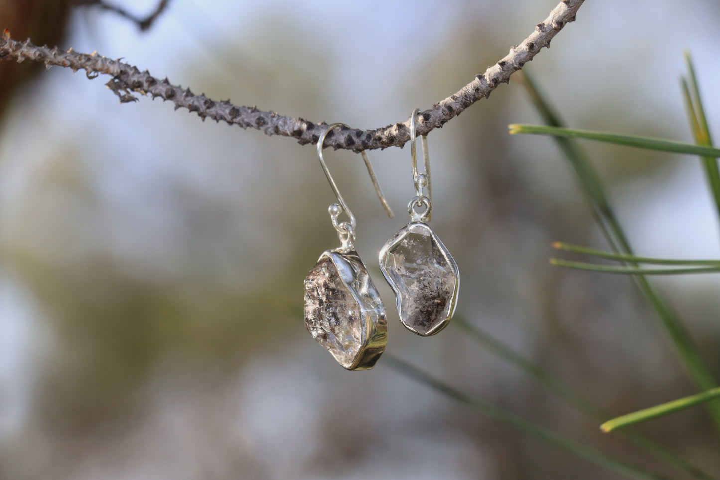 Handcrafted Silver Earrings with Rutilated Quartz. Witchy jewelry for discernment and focus.